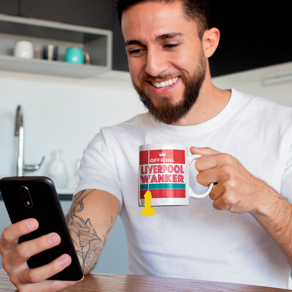 Lifestyle photo of Liverpool football fan mug used as a humorous gift for Reds supporters
