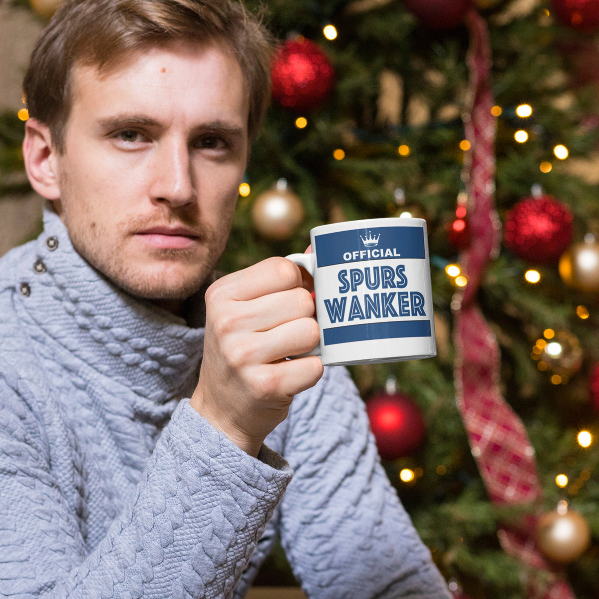 Football secret santa gift featuring a funny rival team mug with league fan cup.